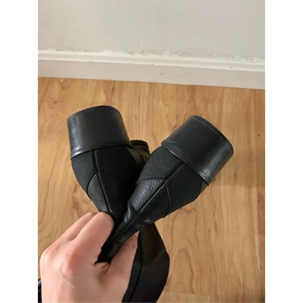 Black riding boots, size 9.5with expendable calf